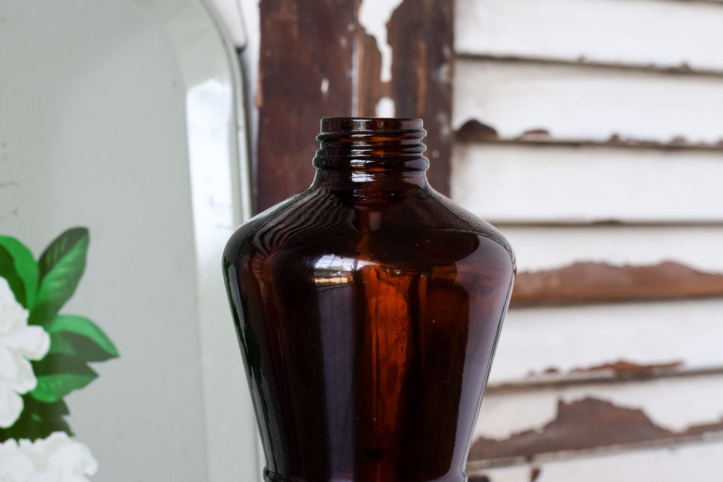 Tall Hourglass Amber Bottle